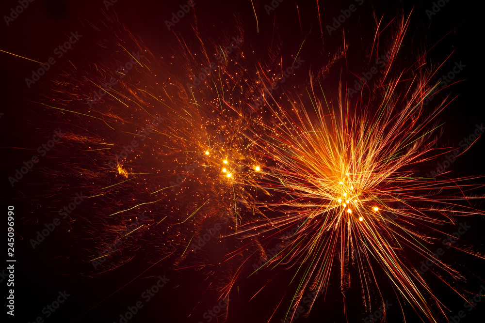 Fireworks in the sky at night as a background Fireworks in the sky at night as a background