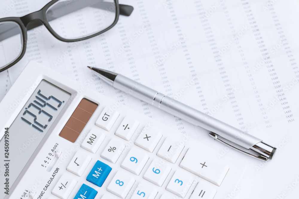 Business still life with calculator on table in office. Business still life with calculator on table in office.