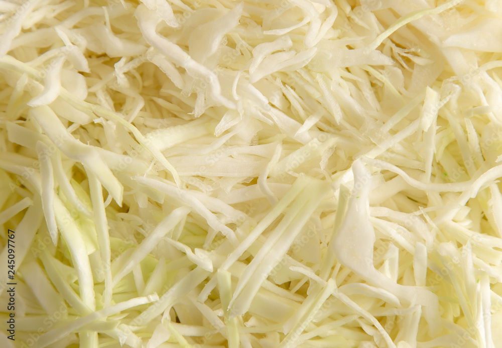 Sliced cabbage on the table as background Sliced cabbage on the table as background