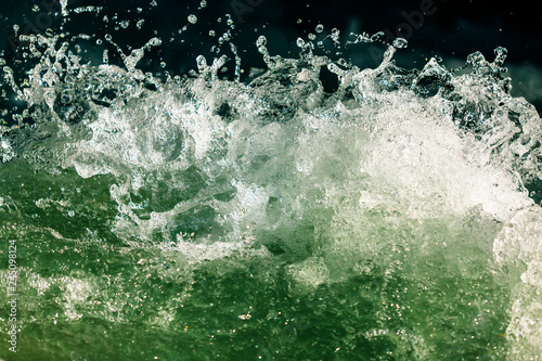 Fototapeta Naklejka Na Ścianę i Meble -  Splashes of water from the waves in the sea
