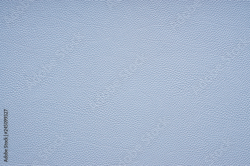 Foto faux or imitation leather background texture in light blue