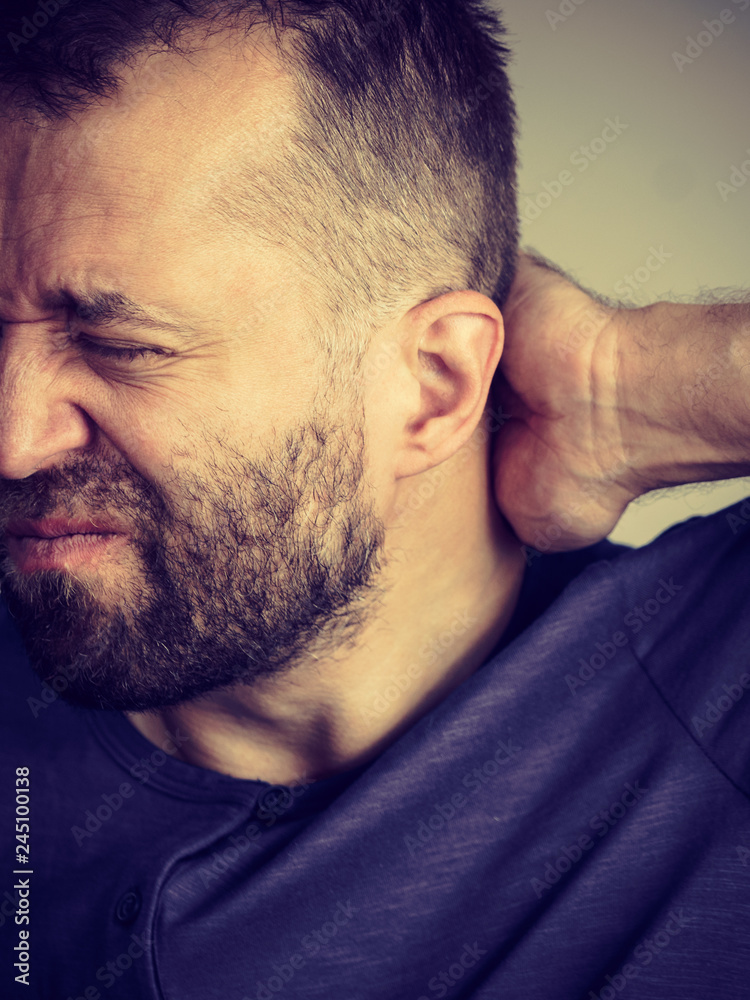Obraz premium Man having neck ache