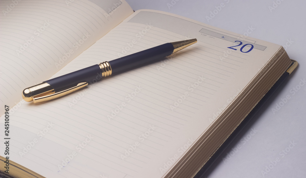 notebook and pen on white background notebook and pen on white background
