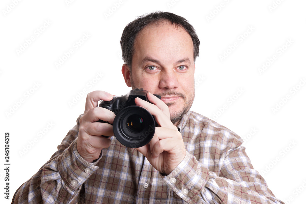 middle aged man holding dslr camera and smiling middle aged man holding dslr camera and smiling