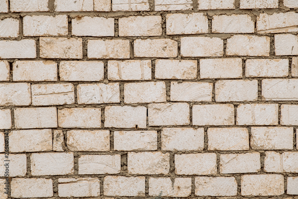 Fototapeta premium stone wall brick texture background beige surface facade