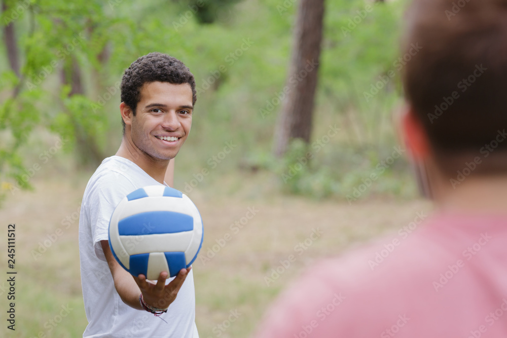 people playing volleyball outdoor people playing volleyball outdoor