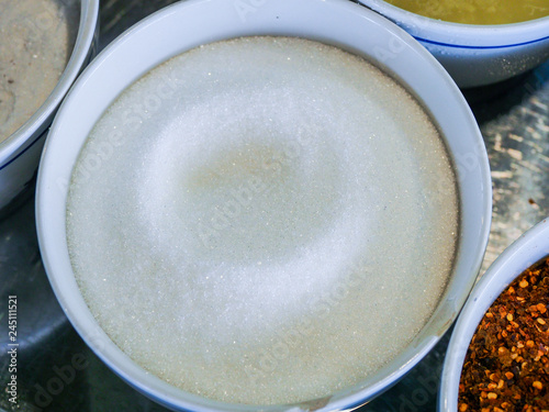 Garnish noodles seasoning Thai style on wood table- sugar, dried. photo