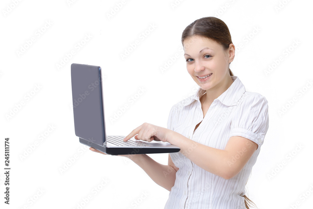 young woman dealer shows an open laptop. isolated on a white background. young woman dealer shows an open laptop. isolated on a white background.