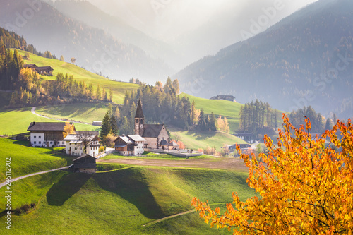 Funes Valley, near Santa Magdalena, during autumn. Dolomites, South Tyrol, Italy photo