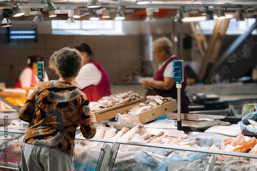 Customer buy a seafood at the fish market