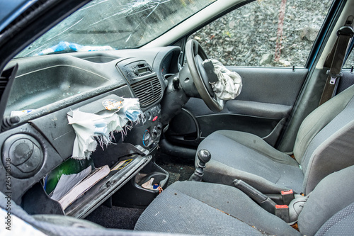 Total loss car with exploded airbag and broken windscreen © Lukassek