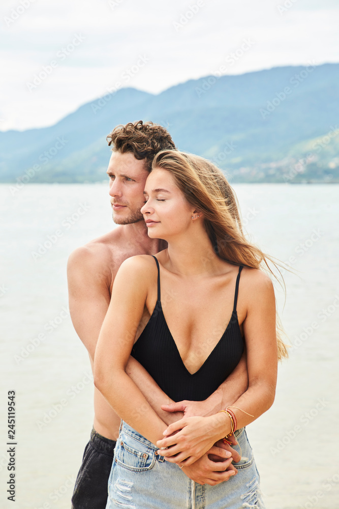 Loving young couple on beach Loving young couple on beach