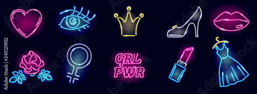 Set of neon girly icons on dark background. Girl power or feminism elements of design: heart, eye, rose, venus mirror, crone, heel, lips, dress, lipstick. Vector 10 EPS illustration.