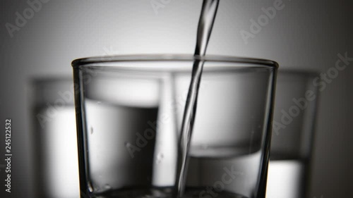 puoring water in to a glass photo