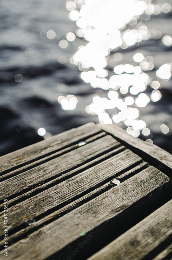 Fototapeta premium Piece of wood over a lake