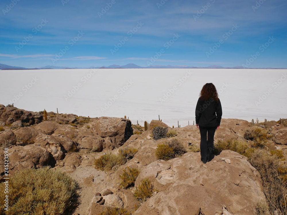 Young tourist at Salar de Uyuni, Bolivia