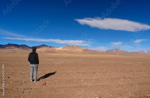 Tourist in the high altitude desert, Bolivia