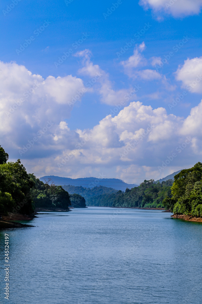 Obraz premium River flow at the top of mountain with blue sky, sky reflection on the river between the mountains