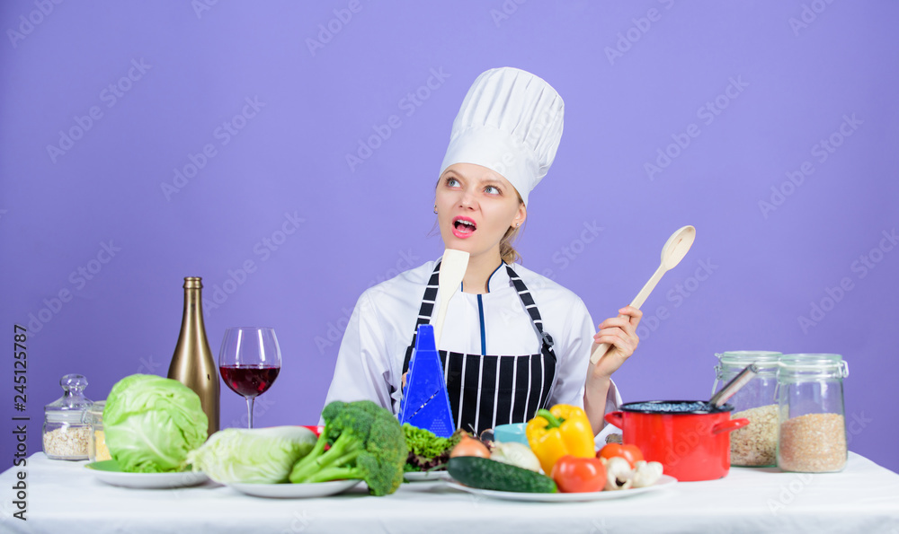 Cooking is her hobby. Cooking healthy food. Girl in hat and apron. Woman chef cooking healthy food. Fresh vegetables ingredients for cooking meal. Delicious recipe concept. Gourmet main dish recipes Cooking is her hobby. Cooking healthy food. Girl in hat and apron. Woman chef cooking healthy food. Fresh vegetables ingredients for cooking meal. Delicious recipe concept. Gourmet main dish recipes