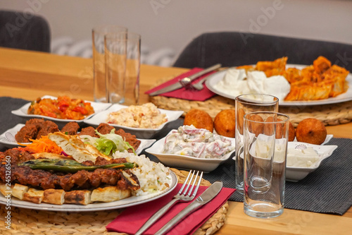 Turkish adana kebab with appetizers close up