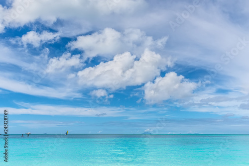 Fototapeta Naklejka Na Ścianę i Meble -  Beautiful marine view on tropical caribbean beach with turquoise water under blue sky and clouds at sunny day as natural background - Valley Church Beach at Antigua and Barbuda island