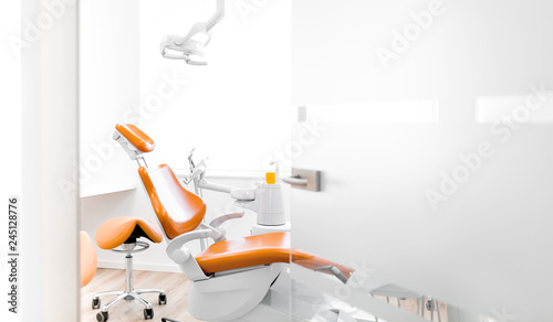 Behandlungsraum beim Zahnarzt mit orange farbenen St  hlen