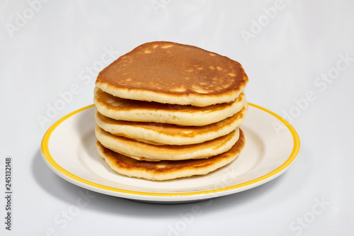 Pancakes on a white plate close up