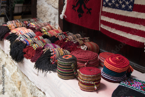 KRUJE, ALBANIA - June 2018: Traditional Ottoman market in Kruja, birth town of National Hero Skanderbeg. Flea market in Albania. Antique items and souvenirs for sale.