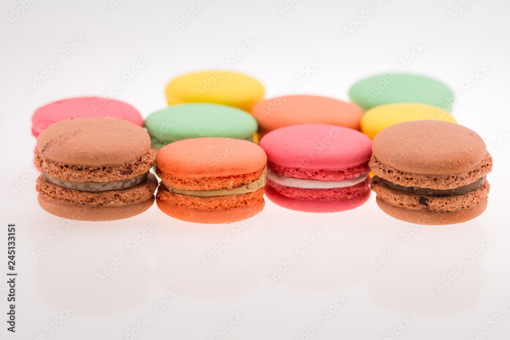 Multi-coloured macarons on white