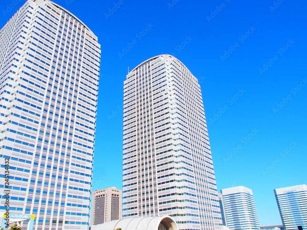 OLYMPUS DIGThe skyscraper stood out against the blue skyITAL CAMERA OLYMPUS DIGThe skyscraper stood out against the blue skyITAL CAMERA