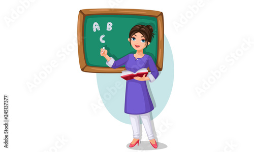 school teacher with green chalkboard holding a book