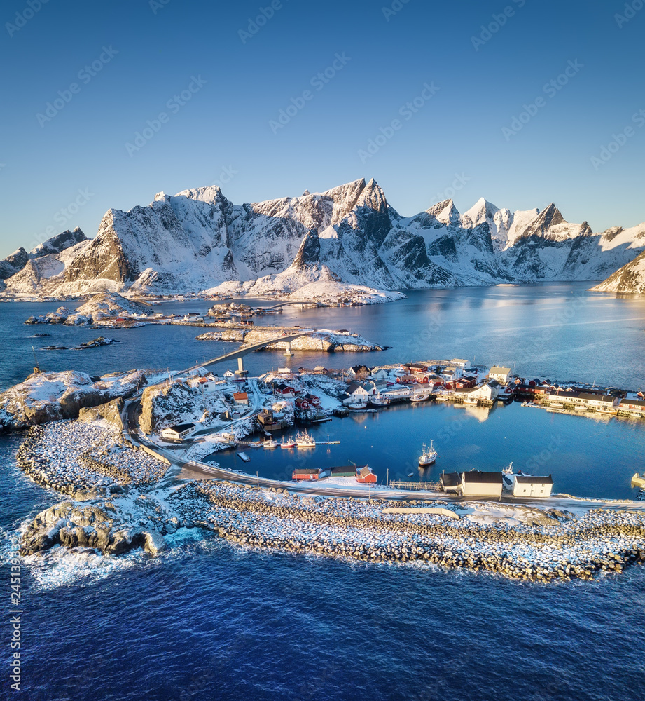 Aerial view at the Lofoten islands, Norway. Mountains and sea during  sunset. Natural landscape from air at the drone. Norway at the winter time  Stock Photo | Adobe Stock