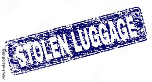 STOLEN LUGGAGE stamp seal print with distress style. Seal shape is a rounded rectangle with frame. Blue vector rubber print of STOLEN LUGGAGE caption with dirty style.