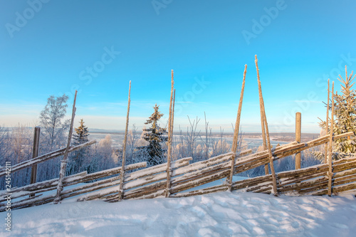 swedish snowy landscape snowy forrest old fence photo