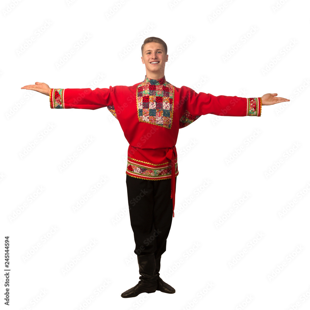 Attractive russian guy dancing in folk costume isolated on white Attractive russian guy dancing in folk costume isolated on white