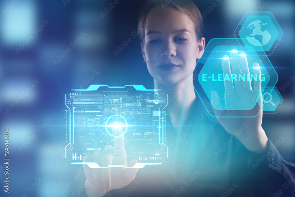 The concept of business, technology, the Internet and the network. A young entrepreneur working on a virtual screen of the future and sees the inscription: E-learning The concept of business, technology, the Internet and the network. A young entrepreneur working on a virtual screen of the future and sees the inscription: E-learning