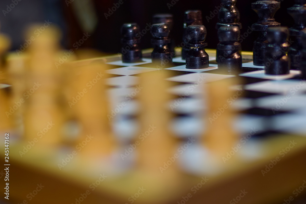 chess board game for ideas and competition and strategy Soft focus on a wooden table chess board game for ideas and competition and strategy Soft focus on a wooden table