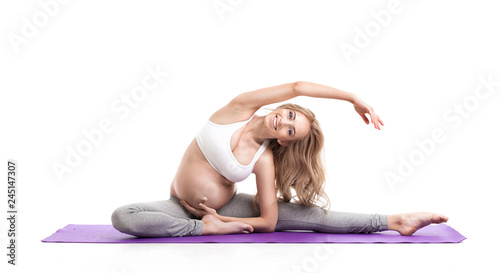 Portrait Of Pregnant Woman Doing Yoga