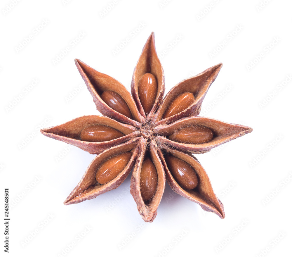 Star anise spice fruits and seeds isolated on white