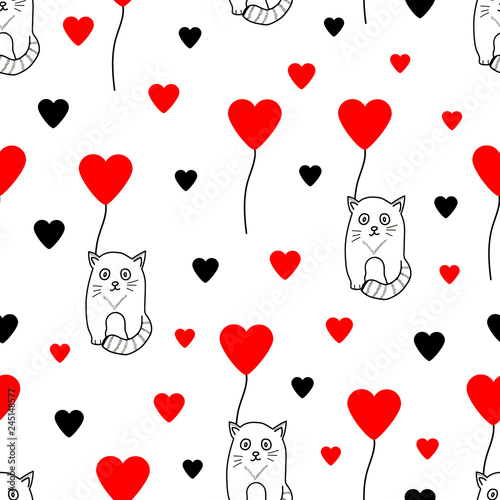 Seamless pattern with cute cats and hearts.