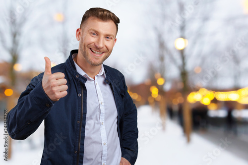 businessman showing thumbs up sign
