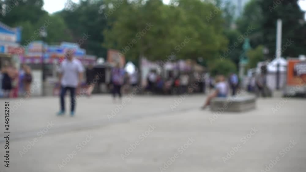 People Walking Through Outdoor Festival People Walking Through Outdoor Festival