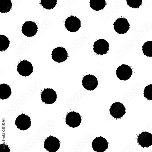 Simple hand drawn black and white pattern with brush ink dots
