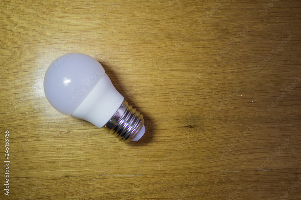 light bulb on black background with copy space for text light bulb on black background with copy space for text