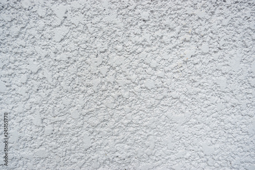 Texture of fine plaster on concrete wall background.