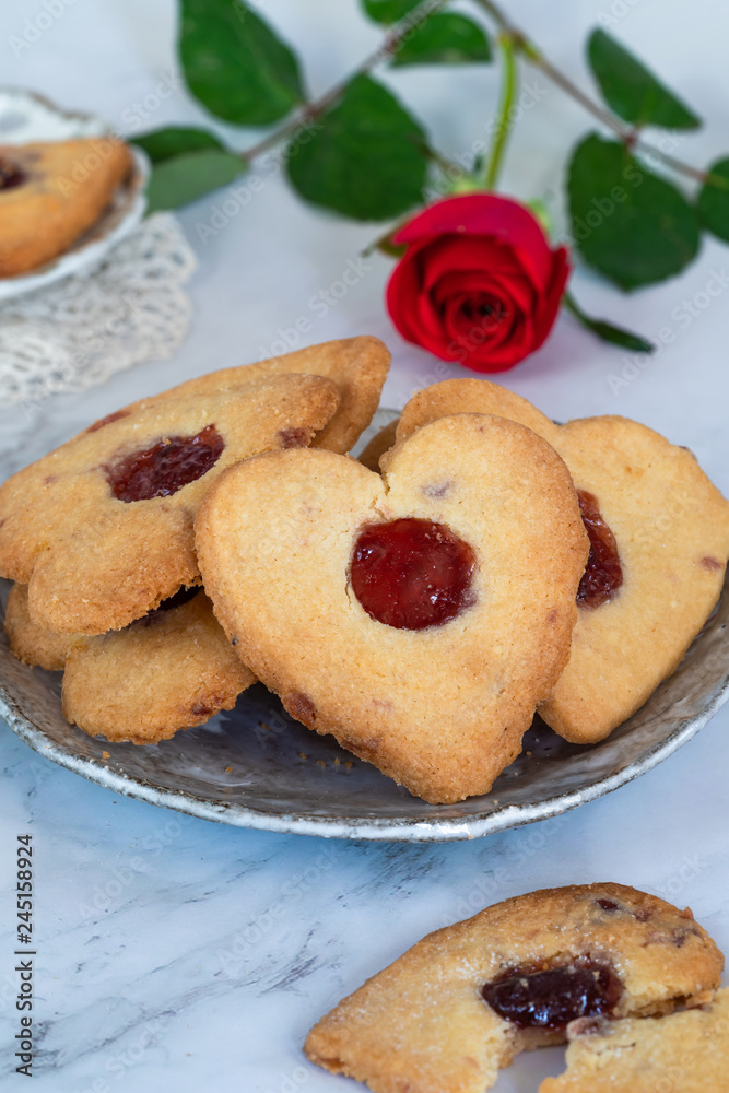 Shortbread hearts with cherry jam. Valentine food idea.