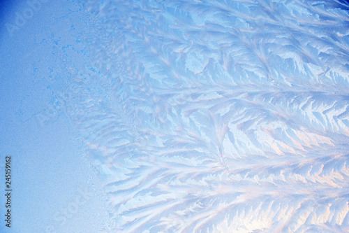 Texture, pattern. Frozen water on the glass, frozenned glass, Ice on window,winter icy patterns