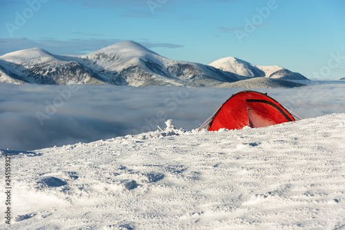 Rest in a tent on a mountain ridge with wonderful landscapes around.