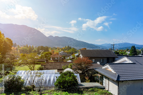 Wallpaper Mural The View of Yufuin countryside with Mount Yufu in Background and blue sky with clouds in autumn season. onsen town, Yufuin, Oita, Kyushu, Japan Torontodigital.ca