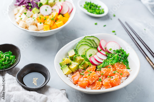 Fresh hawaiian salmon and tofu poke bowl for healthy lunch